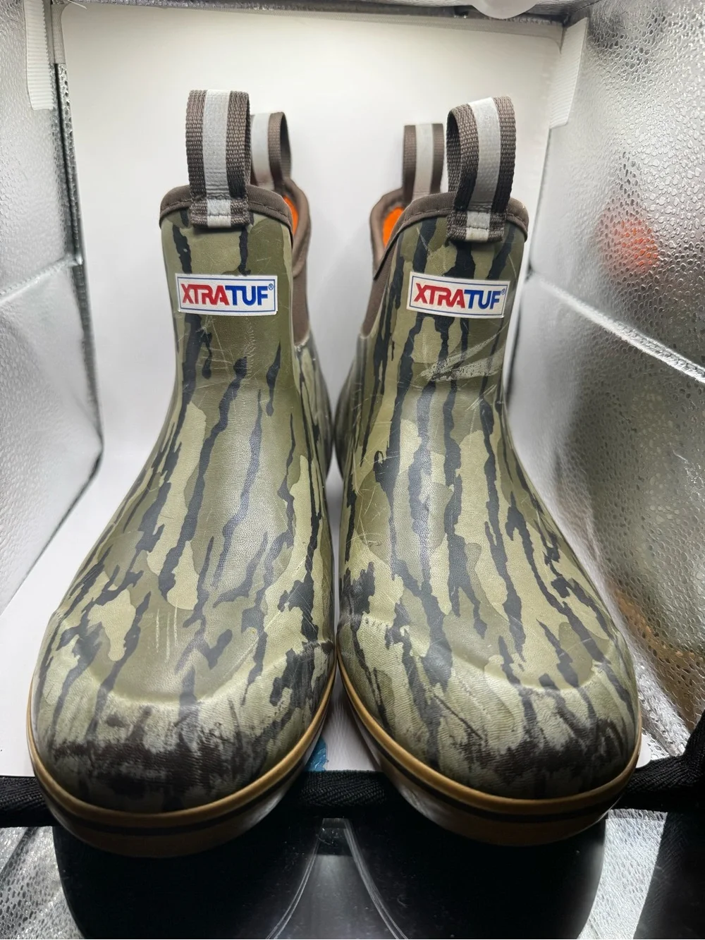 Men’s These are the XTRATUF Men's Mossy Oak Bottomland Ankle Deck Boots, featuri
